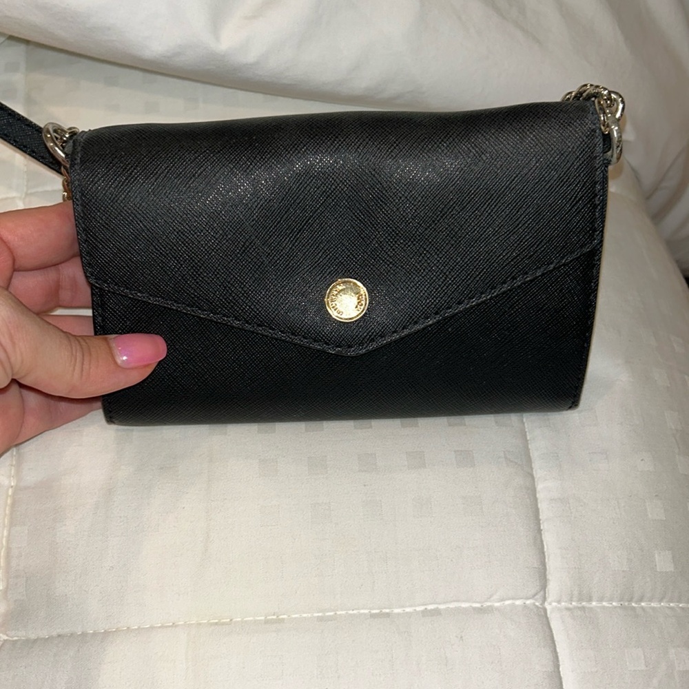 Used black and gold Michael Kors chain wallet